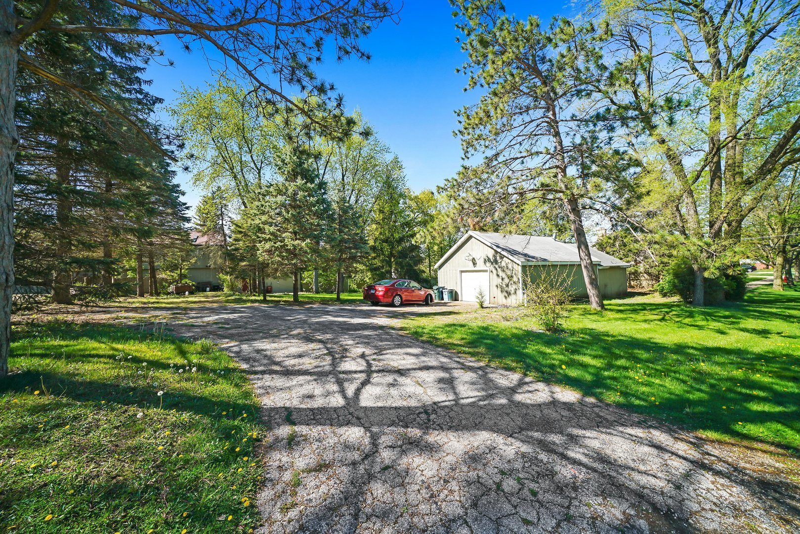 724 South Plum Grove Road Palatine, IL 60067 - Photo 23 of 37 a front view of a house with garden