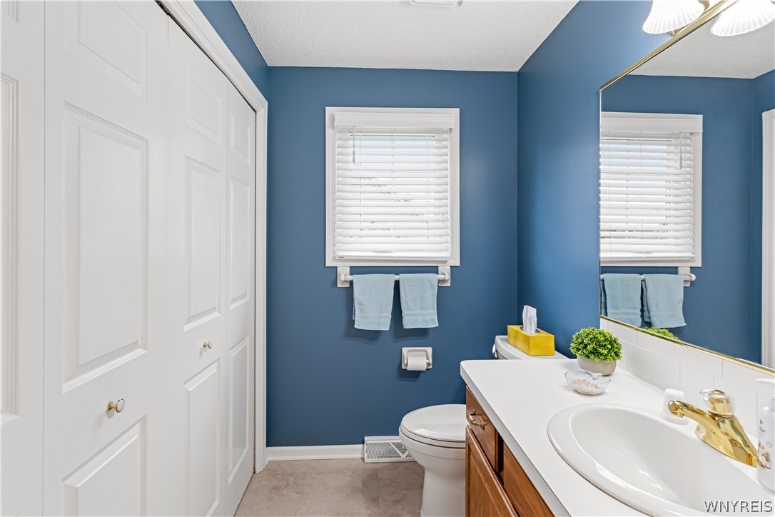 2850 Amsdell Road, Unit 34 Hamburg, NY 14075 - Photo 15 of 33 Clean lines and a spacious vanity create a functional and well-proportioned bathroom layout.
