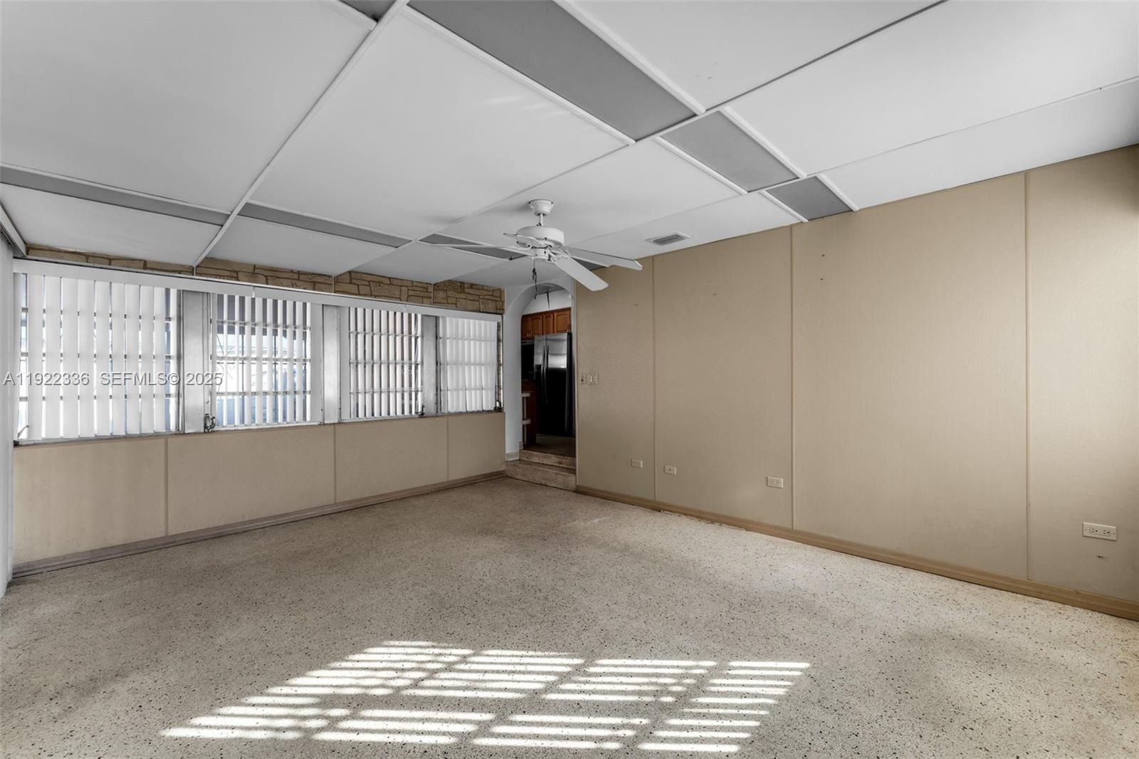 6841 Southwest 1st Street Miami, FL 33144 - Photo 11 of 30 a view of an empty room with a window