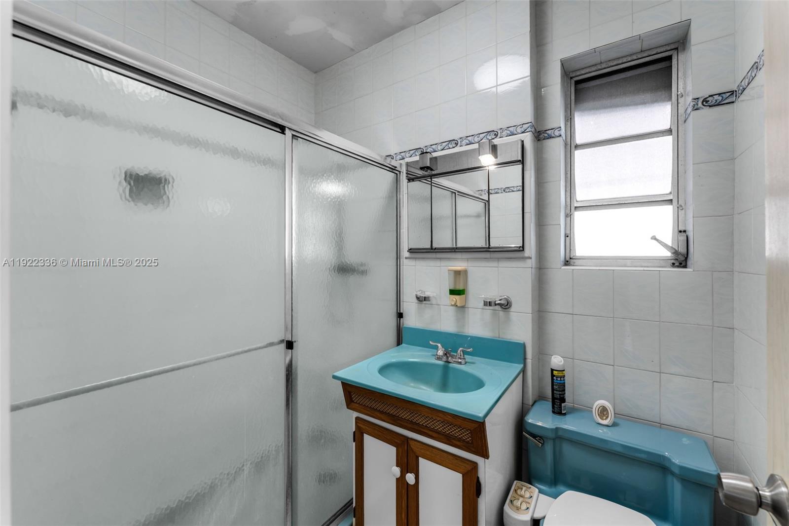 6841 Southwest 1st Street Miami, FL 33144 - Photo 14 of 30 a bathroom with a bath tub and a shower