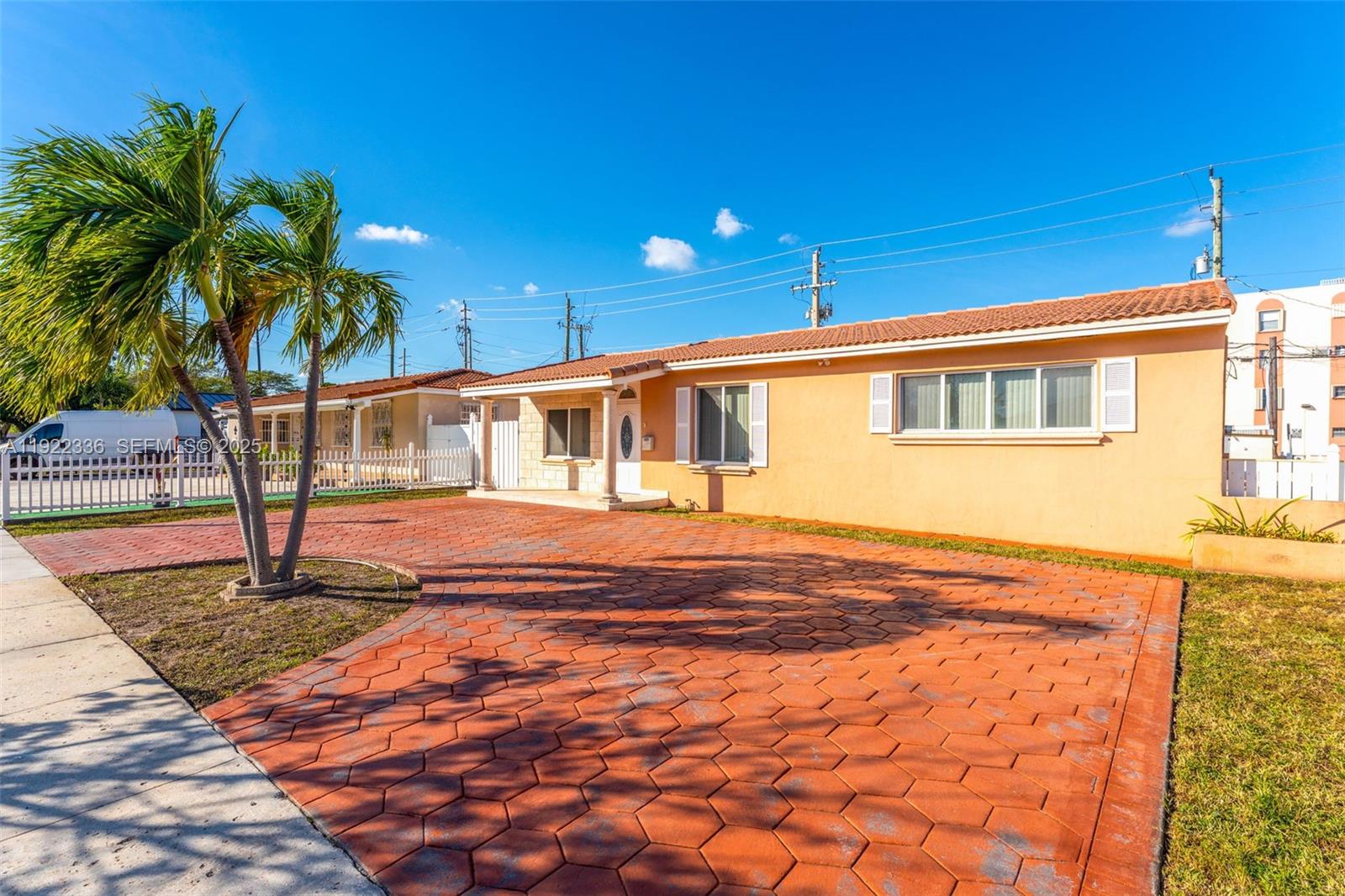 6841 Southwest 1st Street Miami, FL 33144 - Photo 2 of 30 a house view with swimming pool