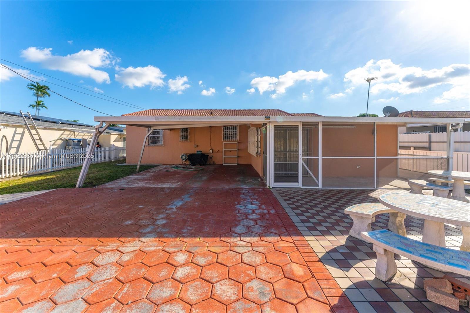 6841 Southwest 1st Street Miami, FL 33144 - Photo 21 of 30 a view of a house with backyard and sitting area