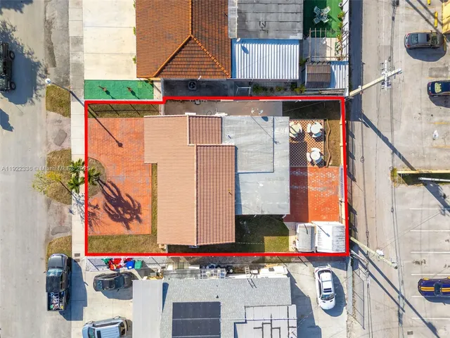 a street sign on a street next to a building