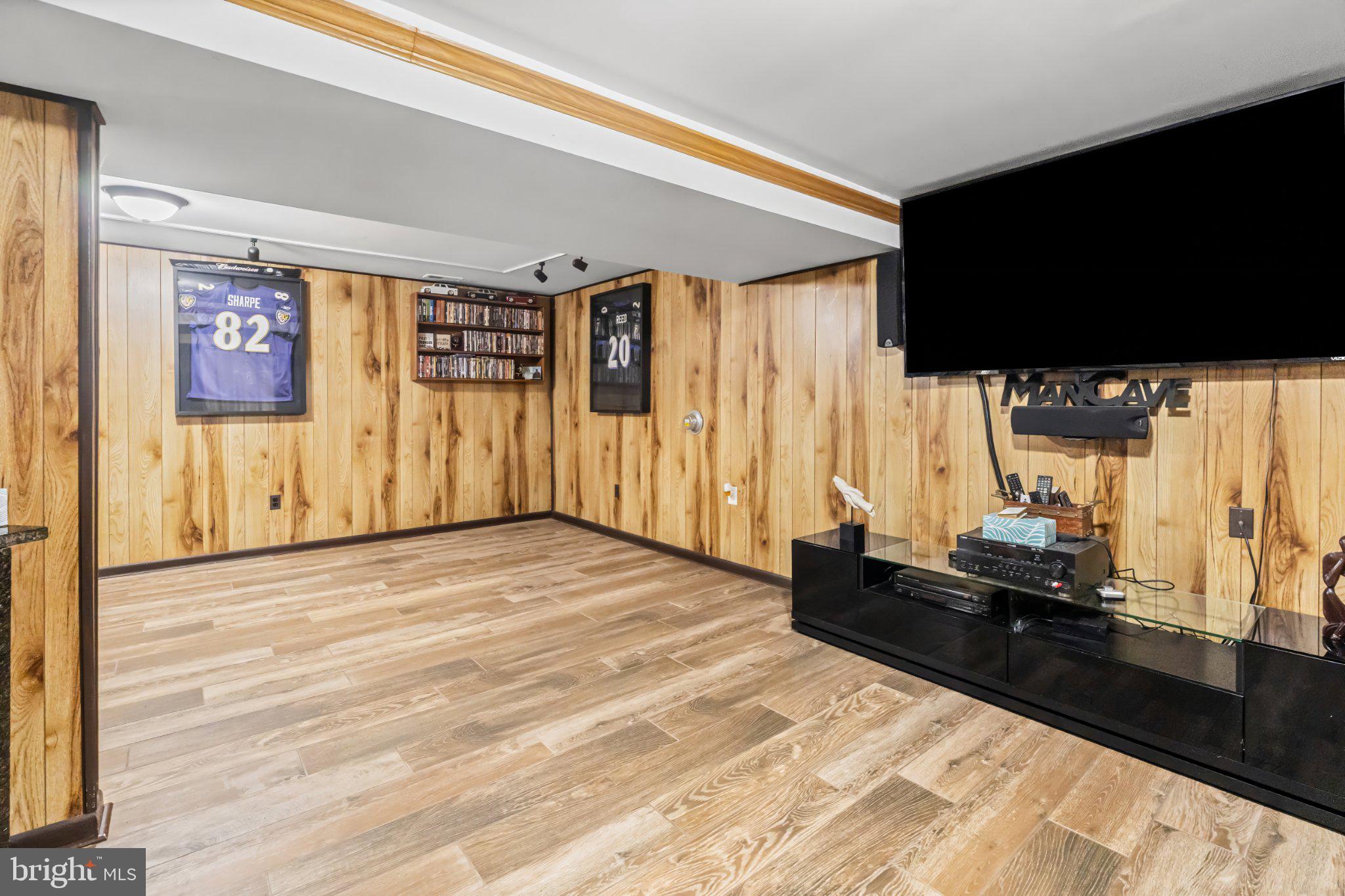 1317 Roxboro Road Baltimore, MD 21237 - Photo 23 of 30 Cozy basement retreat with wood accents.
