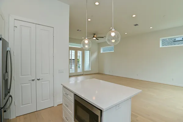 a kitchen with a sink and cabinets