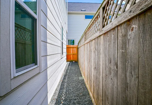 a view of balcony with wooden floor