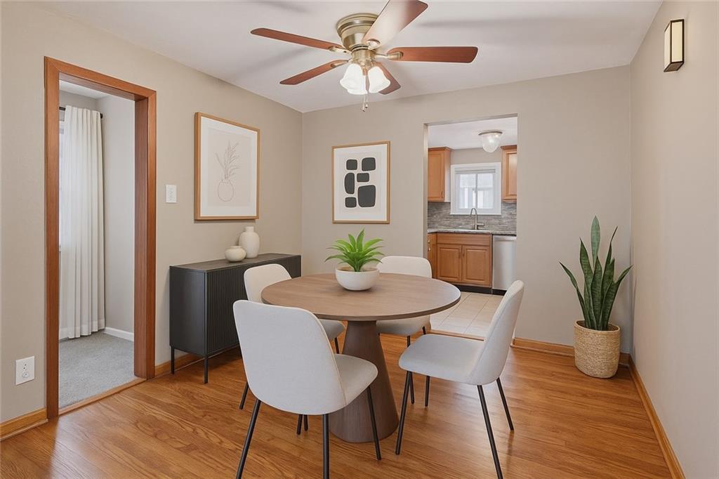 459 East Garden Road Pittsburgh, PA 15227 - Photo 11 of 33 a view of a dining room with furniture and wooden floor