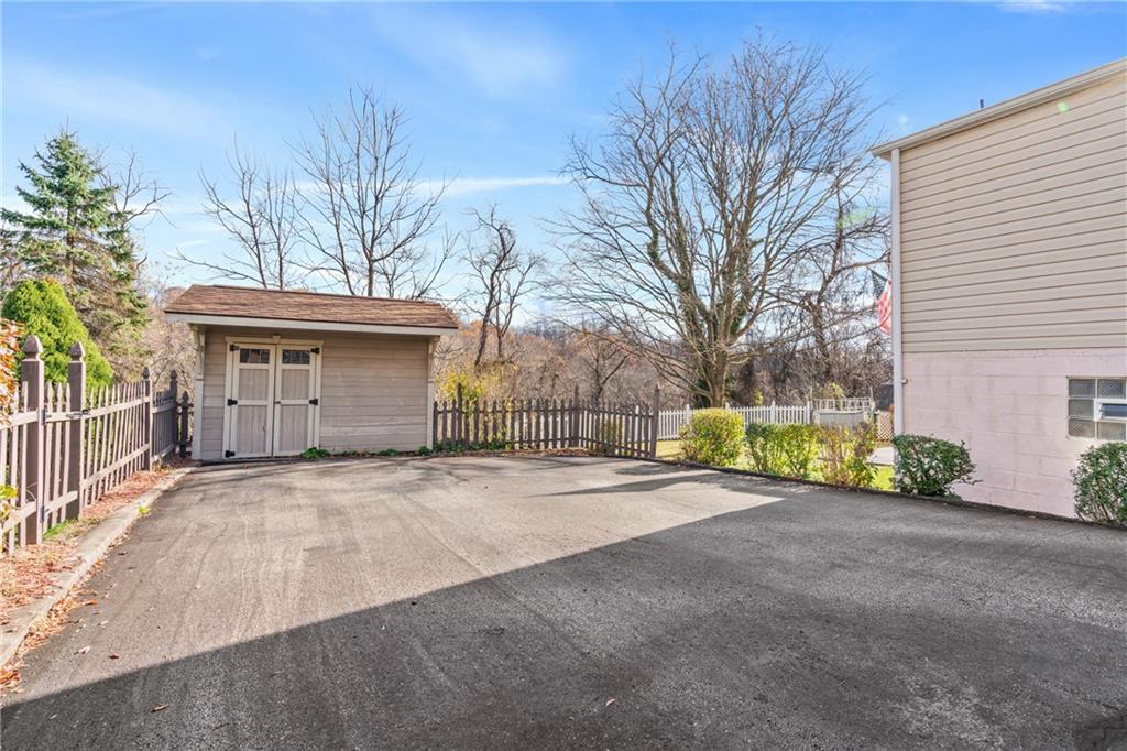 459 East Garden Road Pittsburgh, PA 15227 - Photo 26 of 33 a view of a house with a yard and garage