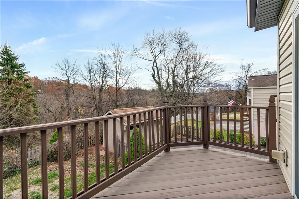 459 East Garden Road Pittsburgh, PA 15227 - Photo 27 of 33 a balcony with wooden floor and fence