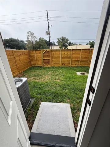 a view of a garden from a balcony