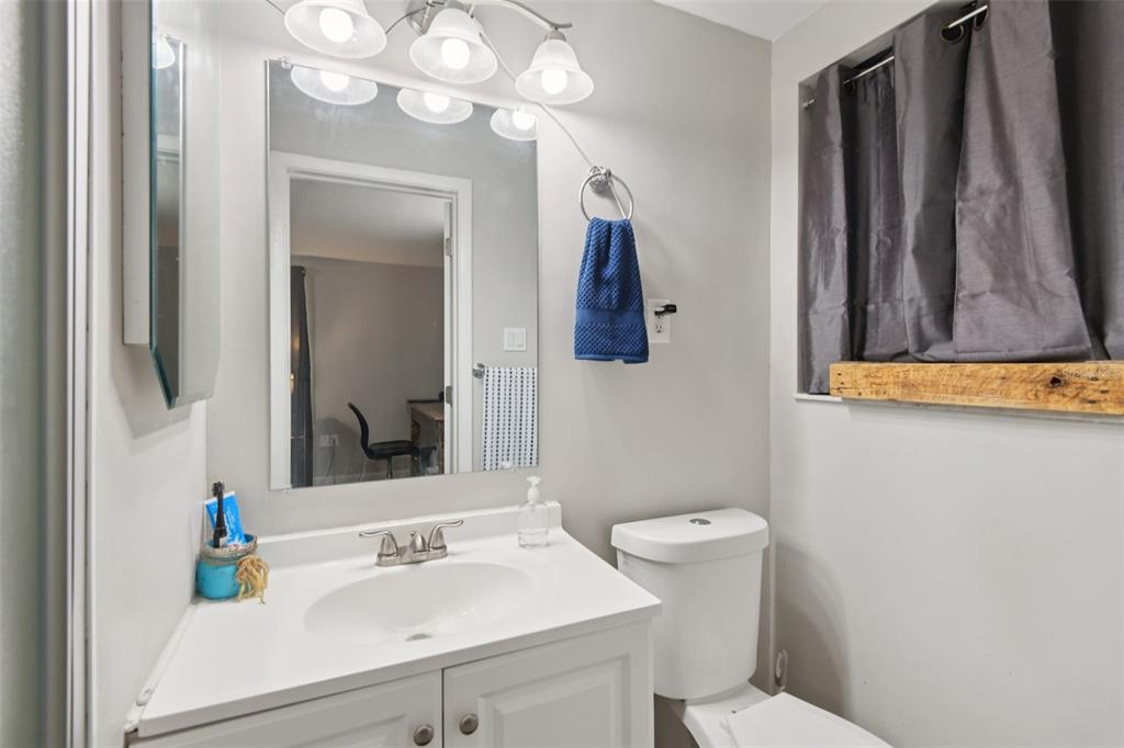7102 Cherry Laurel Drive Port Richey, FL 34668 - Photo 18 of 39 a bathroom with a sink toilet and shower