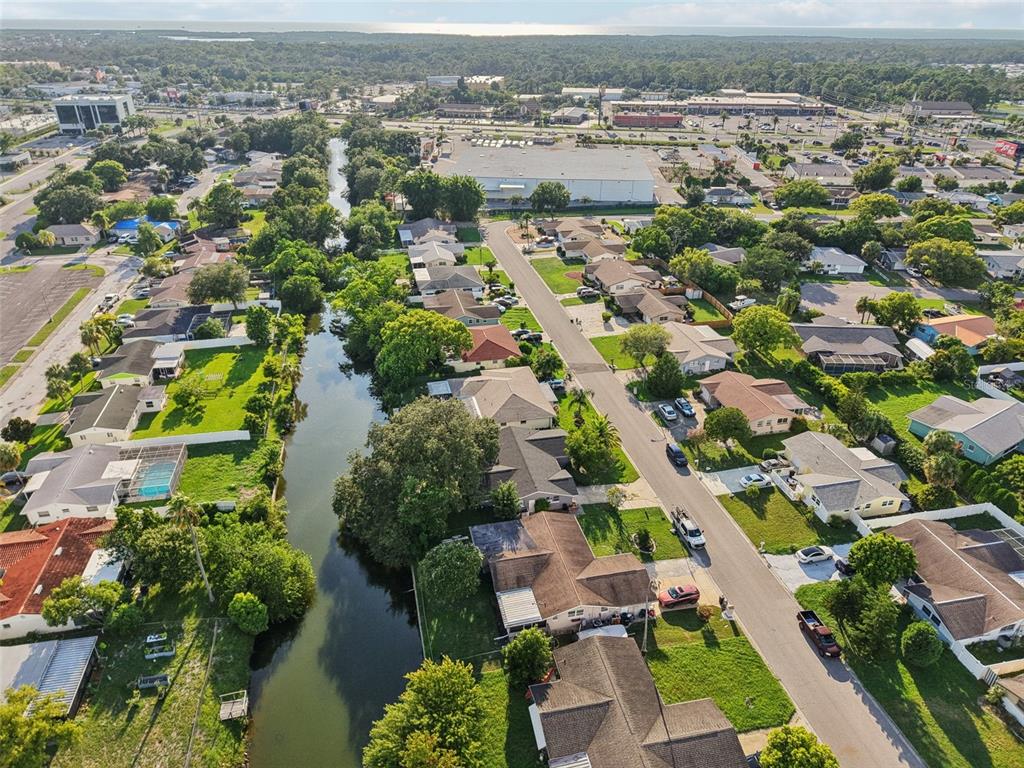 7102 Cherry Laurel Drive Port Richey, FL 34668 - Photo 35 of 39 an aerial view of residential houses with outdoor space