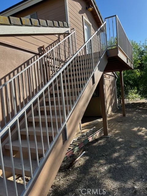 a view of balcony with wooden floor
