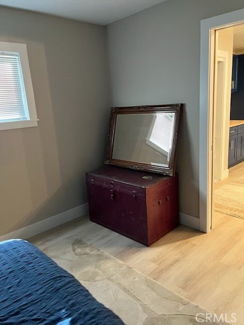 18110 Ave Bosque Murrieta, CA 92562 - Photo 14 of 20 a room with a dresser and a mirror