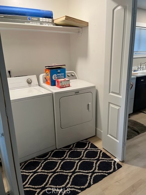 18110 Ave Bosque Murrieta, CA 92562 - Photo 18 of 20 a utility room with dryer and washer