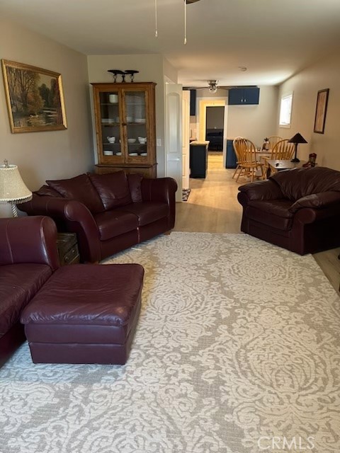 18110 Ave Bosque Murrieta, CA 92562 - Photo 4 of 20 a living room with couches and kitchen view