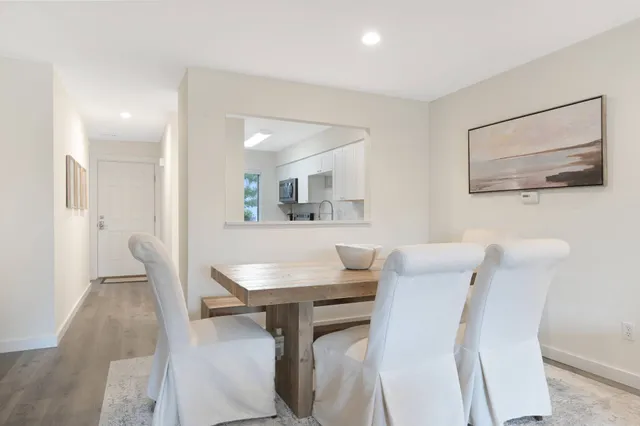 a view of a dining room with furniture