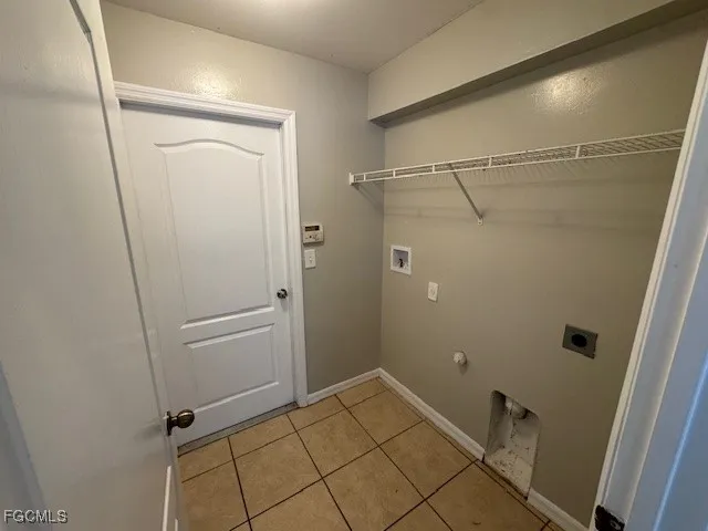 a bathroom with a granite countertop sink and shower