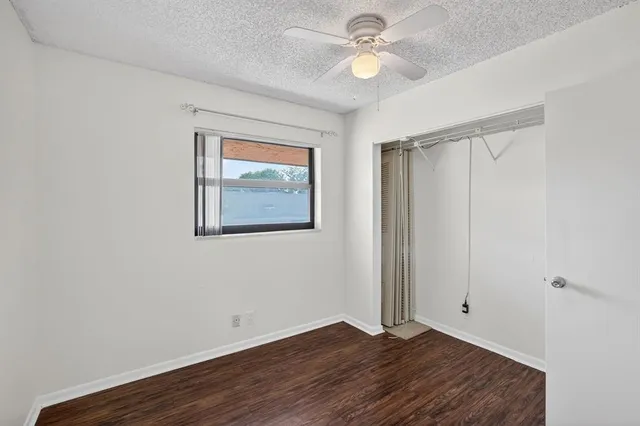 a bathroom with a white bath tub and a shower