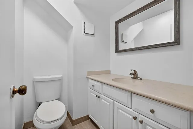 a view of a room with wooden floor and iron walls