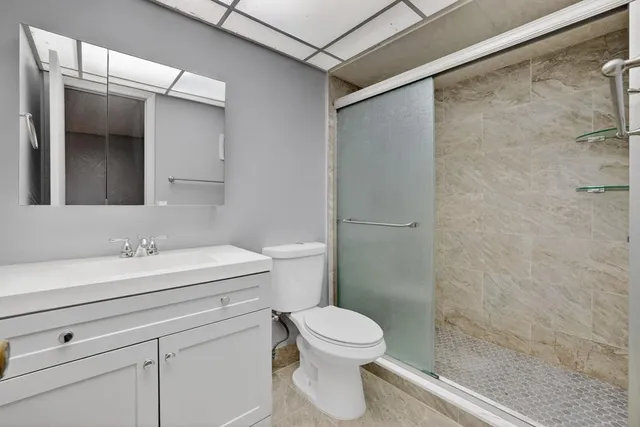 a view of a backyard with sitting area