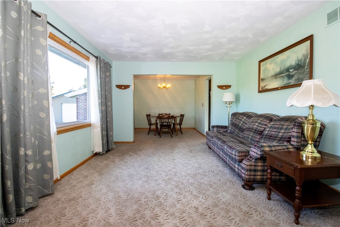 1675 South Funk Road Wooster, OH 44691 - Photo 6 of 34 Living room featuring light carpet