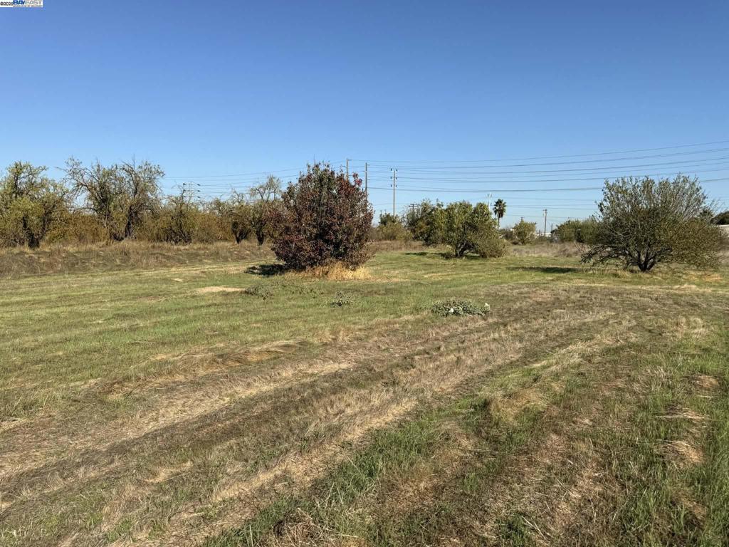 124 Yosemite Meadows Drive Modesto, CA 95357 - Photo 12 of 13 a view of an ocean and beach