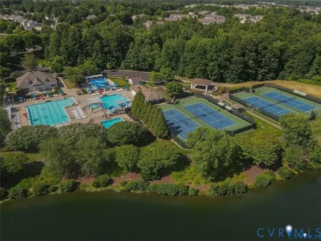 a view of a brick building next to a yard