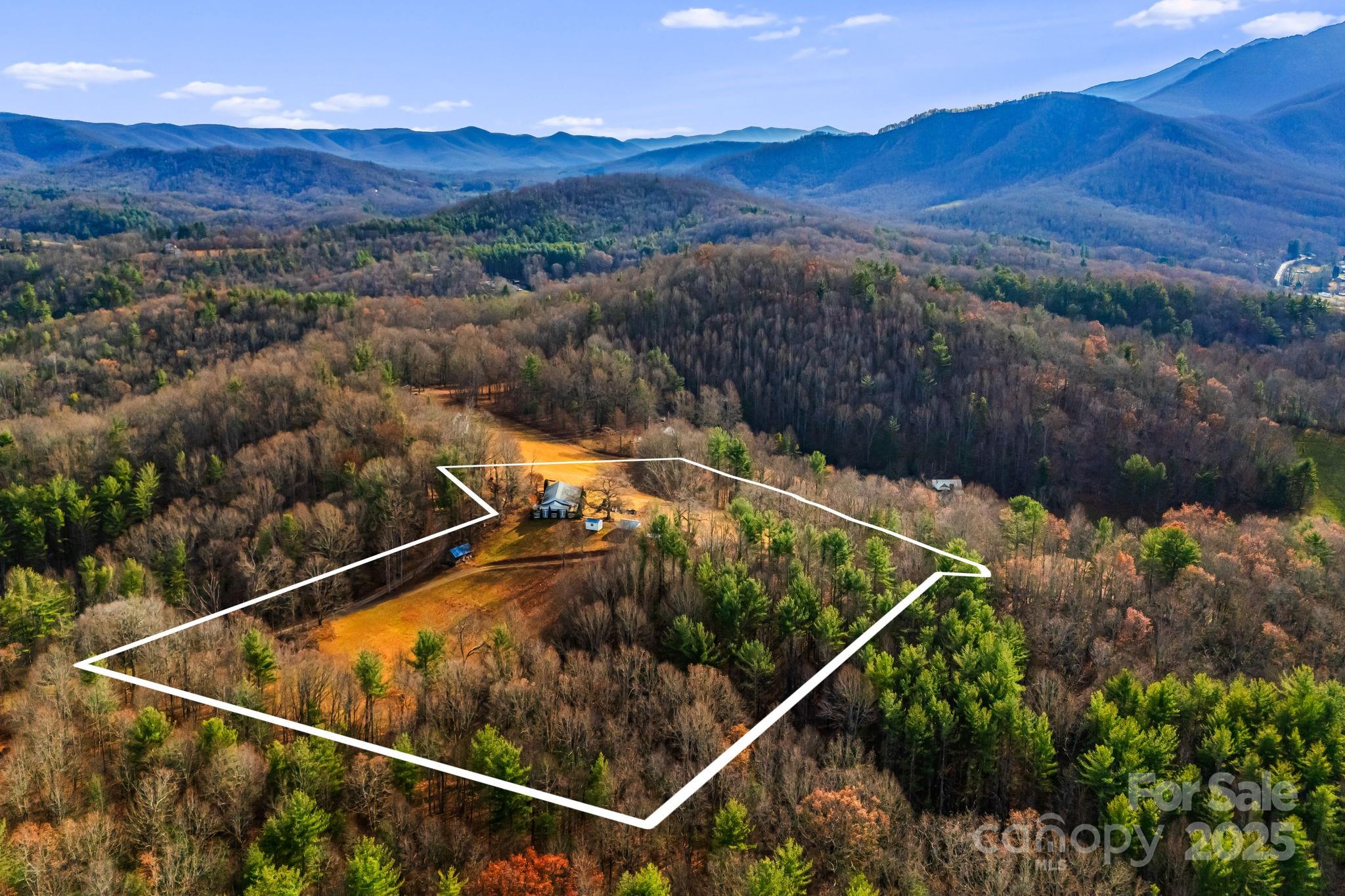 686 Sam Jones Road Burnsville, NC 28714 - Photo 36 of 41 a view of a backyard