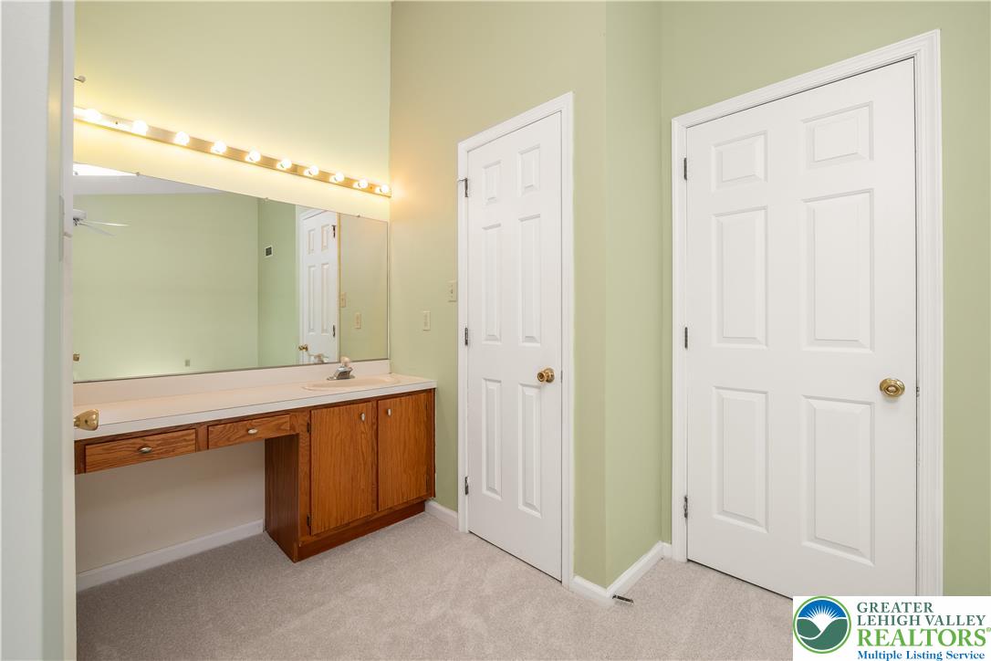 1514 Ravena Street Bethlehem, PA 18015 - Photo 13 of 18 a spacious bathroom with 2 sink tub and a mirror