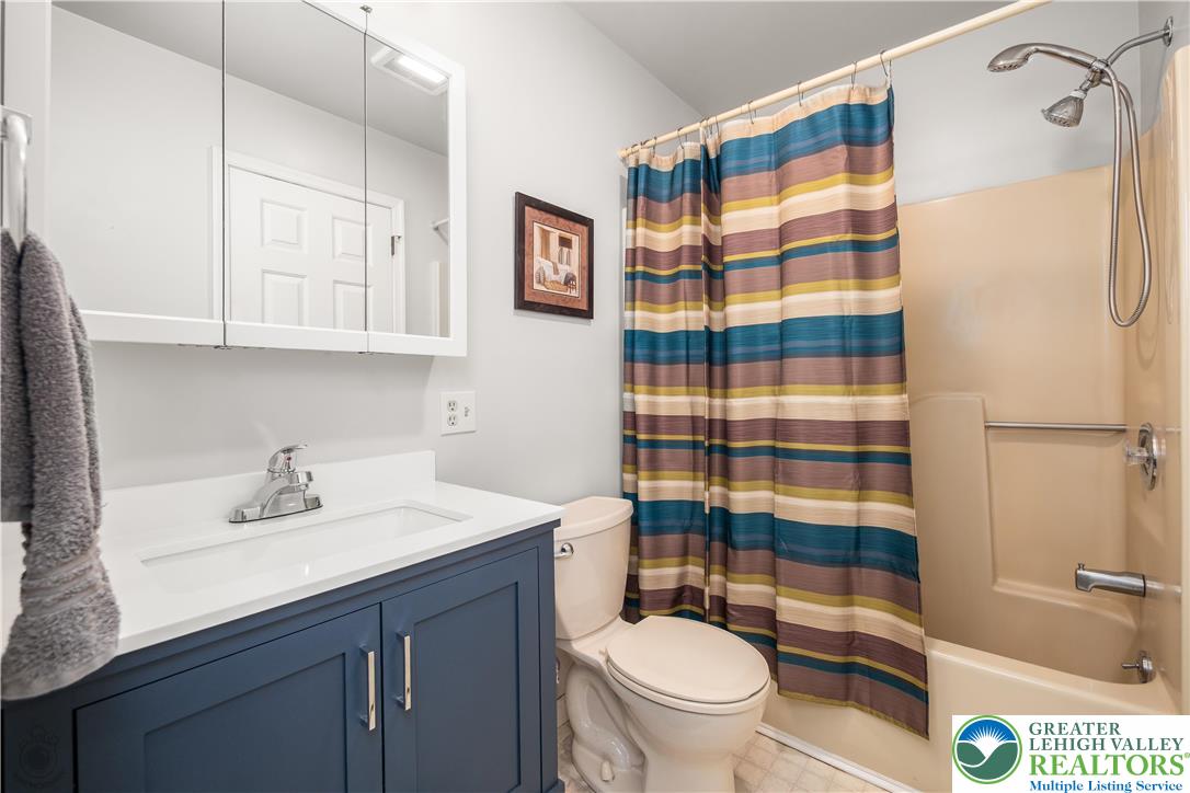 1514 Ravena Street Bethlehem, PA 18015 - Photo 17 of 18 a bathroom with a sink toilet and shower