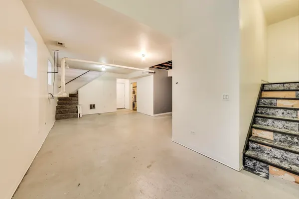 a view of empty room with windows