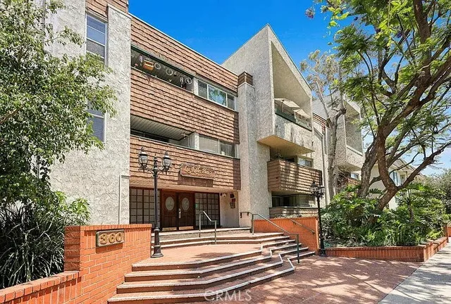 a view of a building with a street