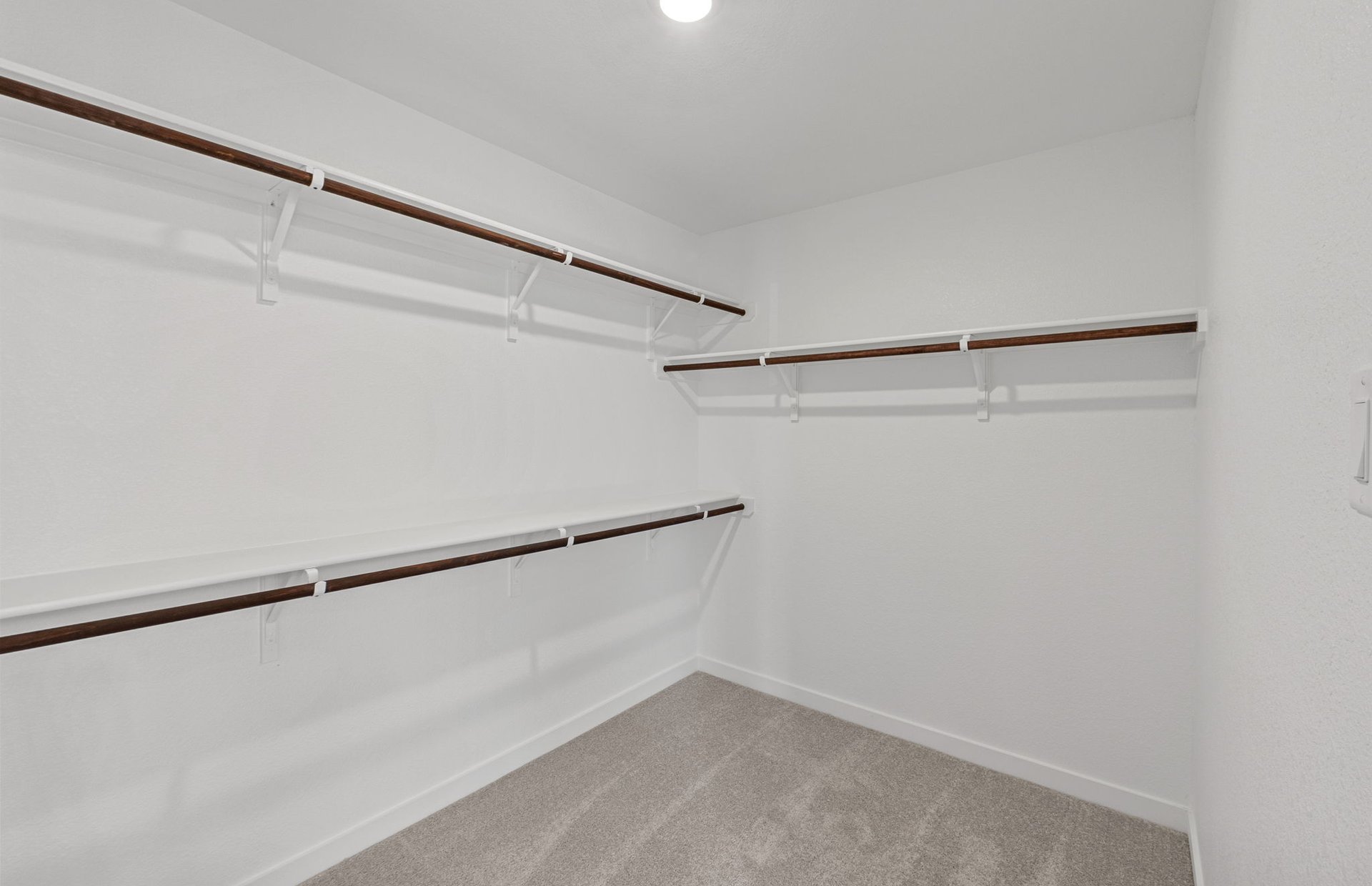 1280 East Main Street, Unit 603 Round Rock, TX 78664 - Photo 17 of 28 a view of a room with racks on the wall