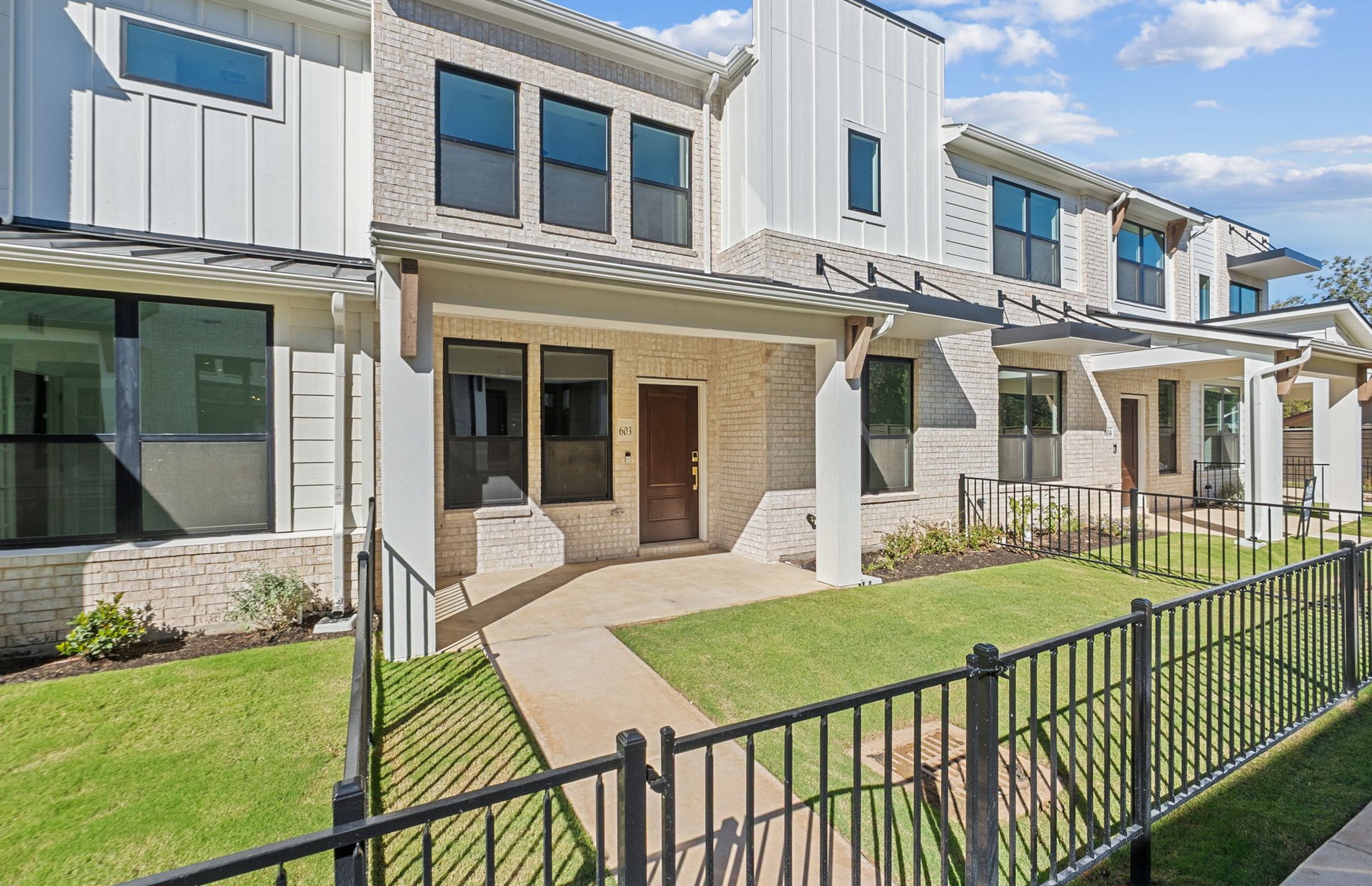 1280 East Main Street, Unit 603 Round Rock, TX 78664 - Photo 2 of 28 a view of a house with backyard and porch