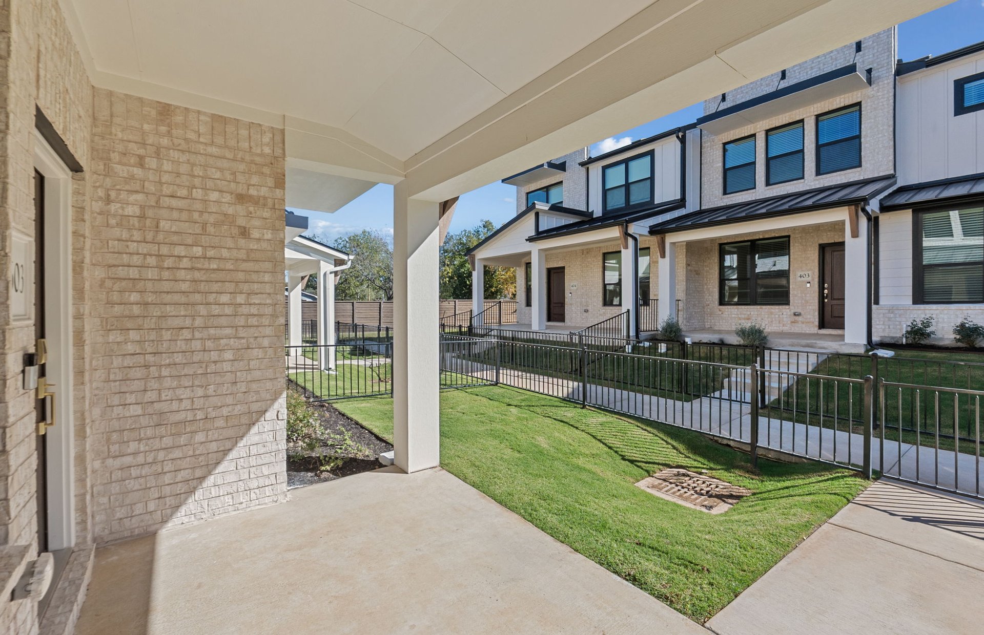 1280 East Main Street, Unit 603 Round Rock, TX 78664 - Photo 4 of 28 a view of house with a yard and furniture
