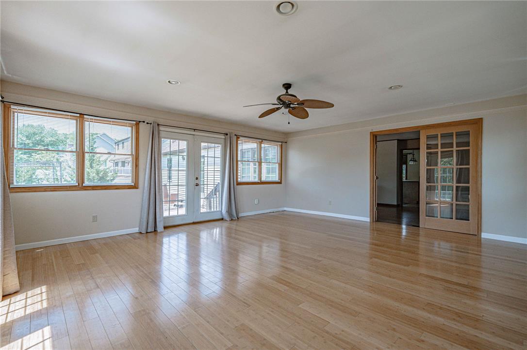 652 Old State Road Oley, PA 19547 - Photo 27 of 54 Bright hardwood floors and abundant natural light fill this inviting living area.