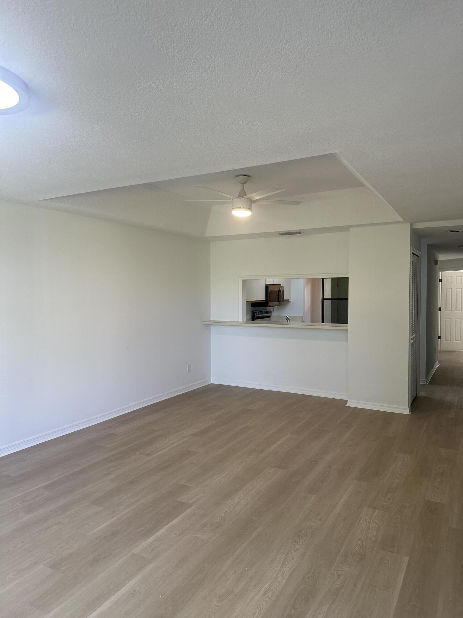 5270 Southeast Seascape Way, Unit 102 Stuart, FL 34997 - Photo 5 of 24 Seascape Living bar (1)