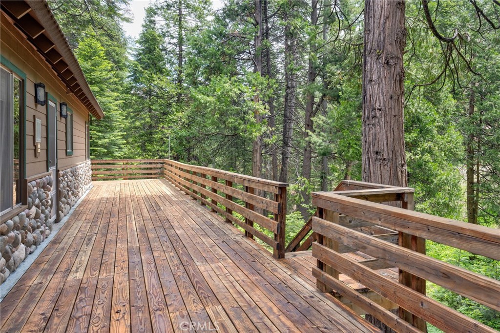 7663 Forest Drive Fish Camp, CA 93623 - Photo 33 of 43 a view of outdoor space with deck and wooden floor