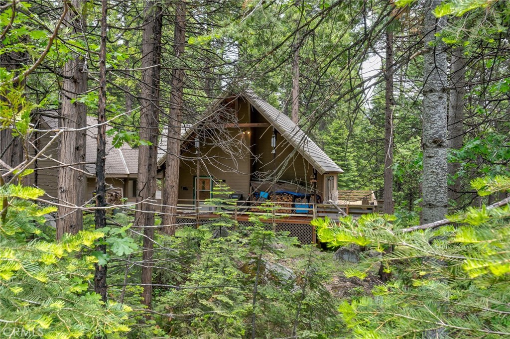 7663 Forest Drive Fish Camp, CA 93623 - Photo 36 of 43 a front view of house with yard