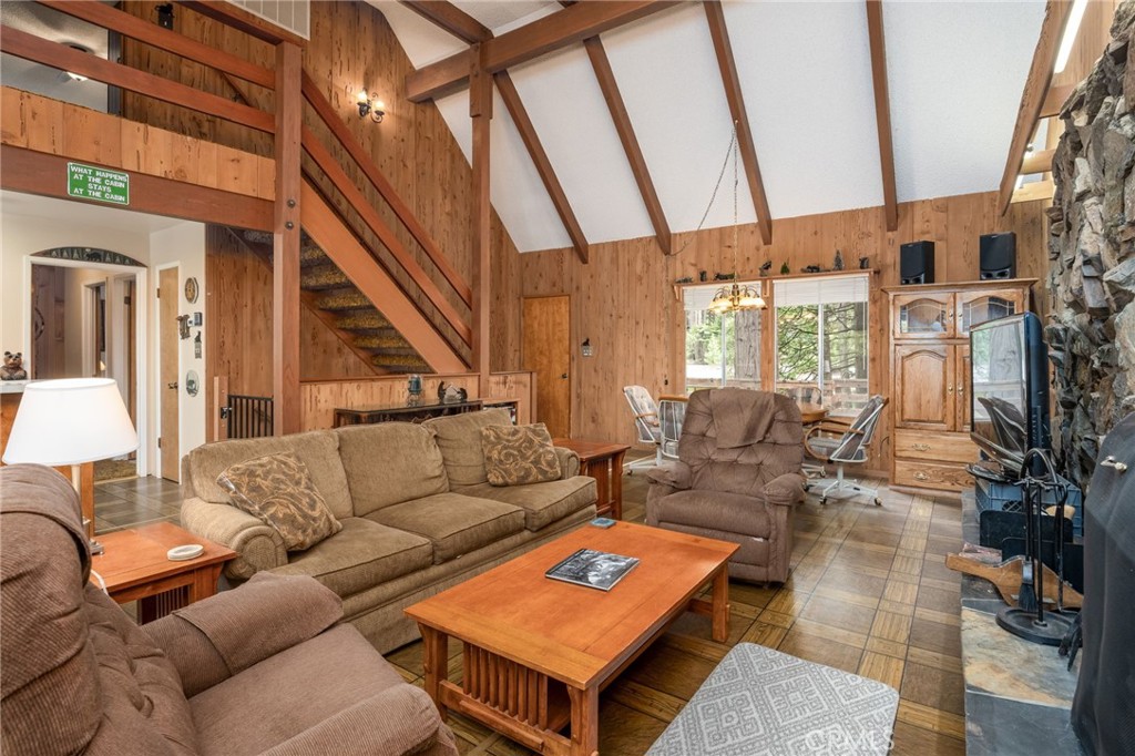 7663 Forest Drive Fish Camp, CA 93623 - Photo 4 of 43 a living room with furniture a rug and white walls