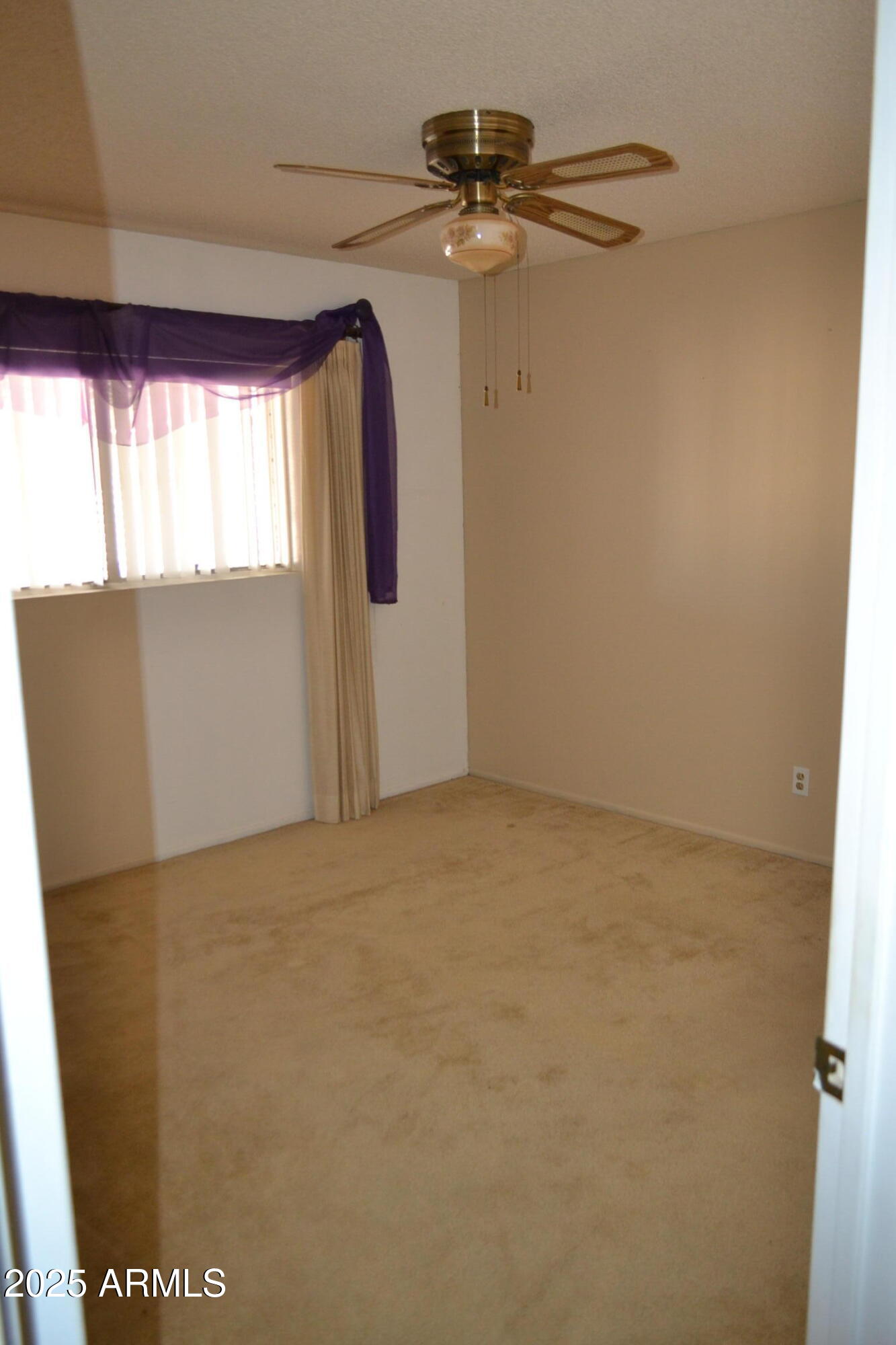 1710 West 13th Avenue Apache Junction, AZ 85120 - Photo 12 of 24 a view of empty room with windows