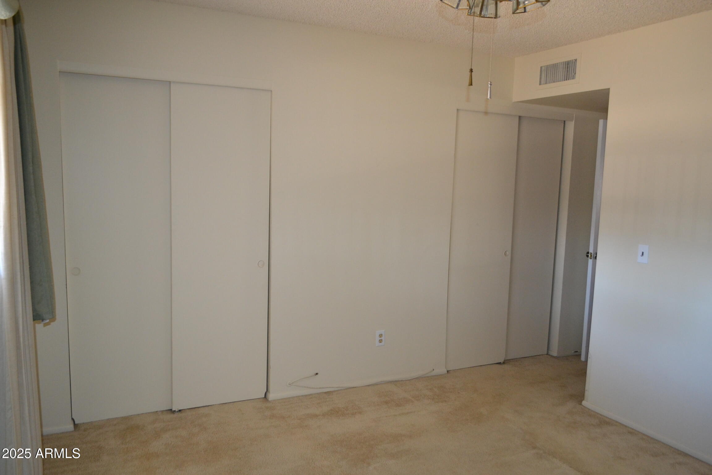 1710 West 13th Avenue Apache Junction, AZ 85120 - Photo 17 of 24 a view of an empty room