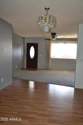 a view of a big room with wooden floor