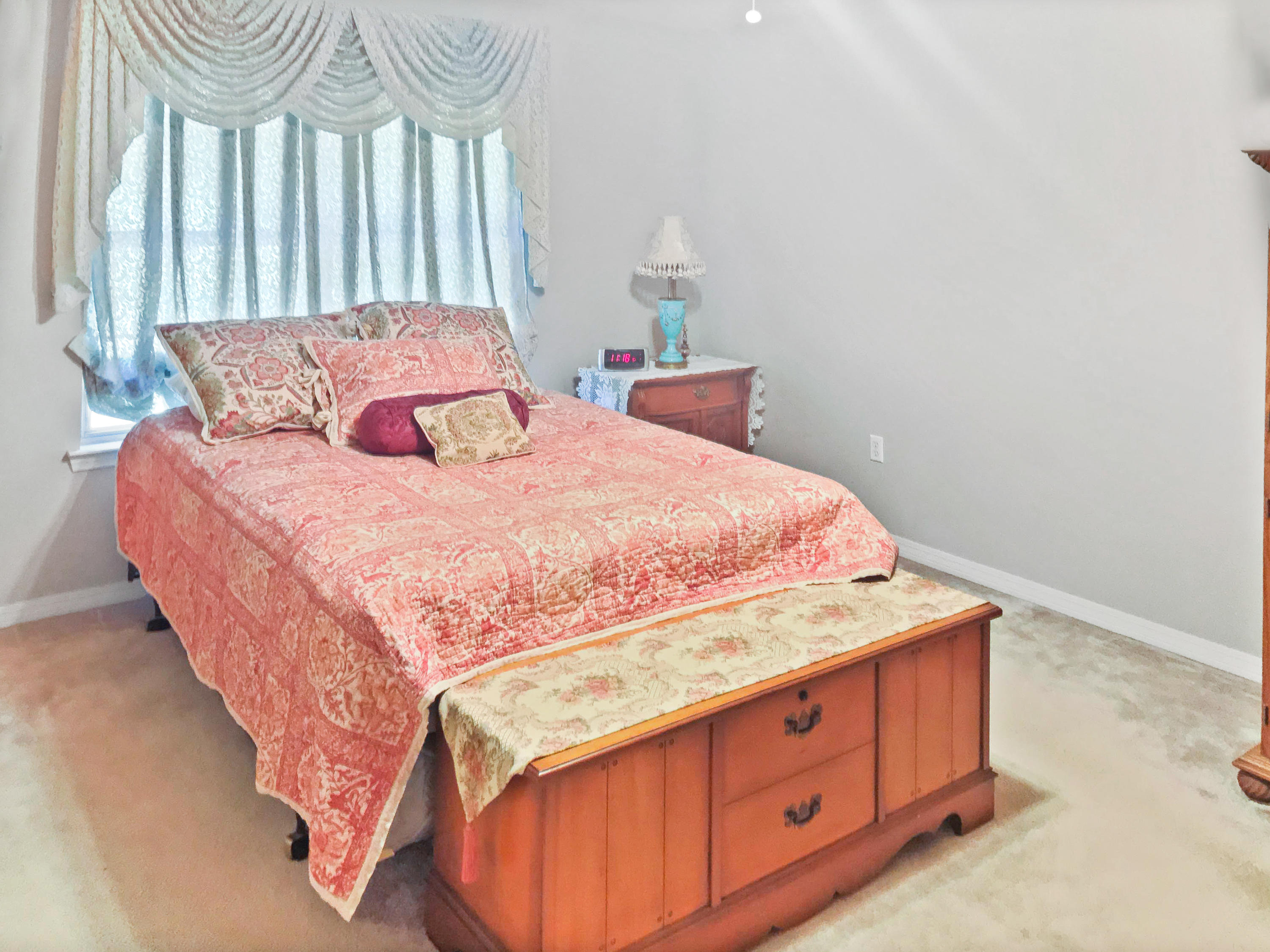 4441 Antioch Road Crestview, FL 32536 - Photo 11 of 14 a bedroom with a bed and a window