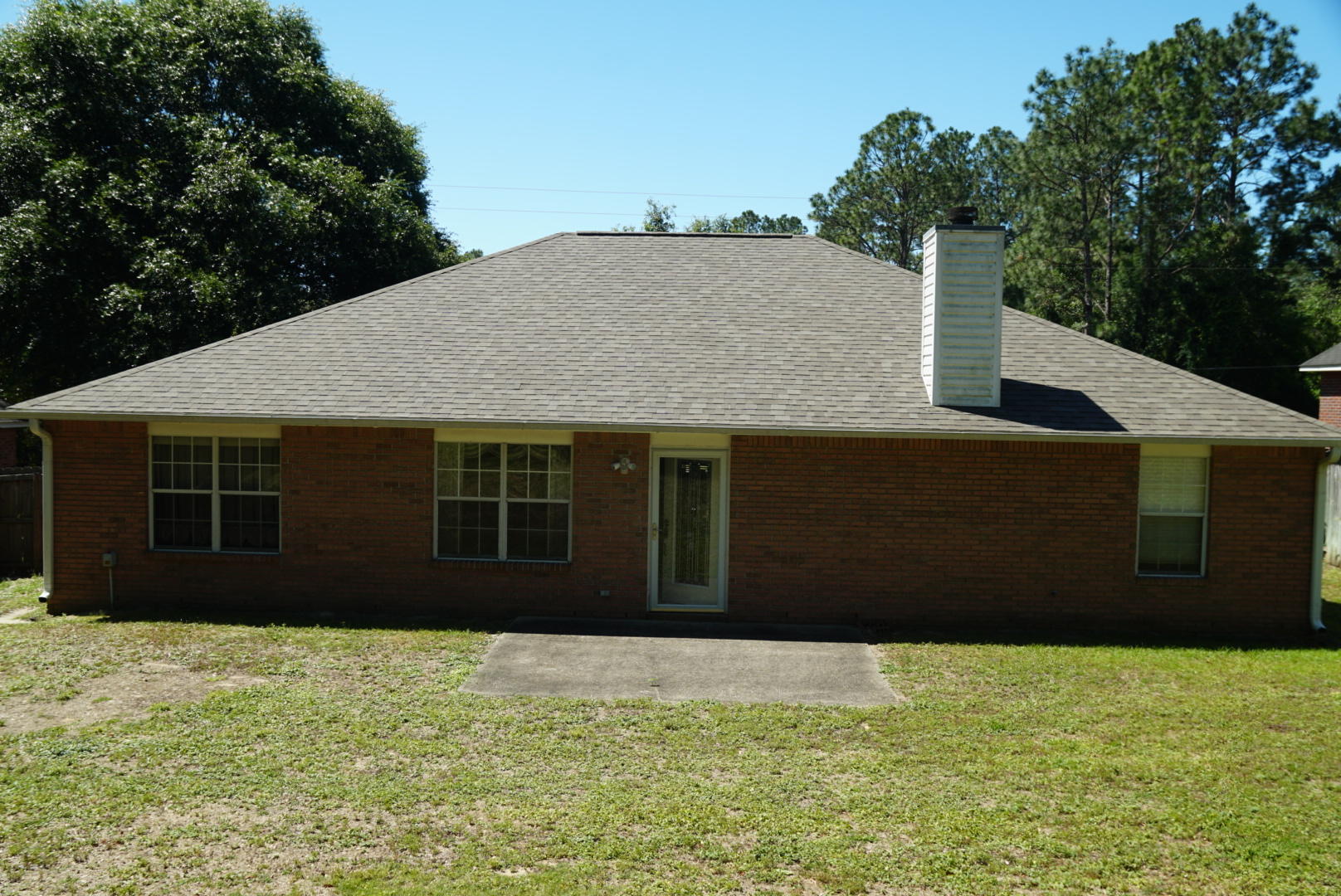 4441 Antioch Road Crestview, FL 32536 - Photo 14 of 14 a black house with yard in front of it