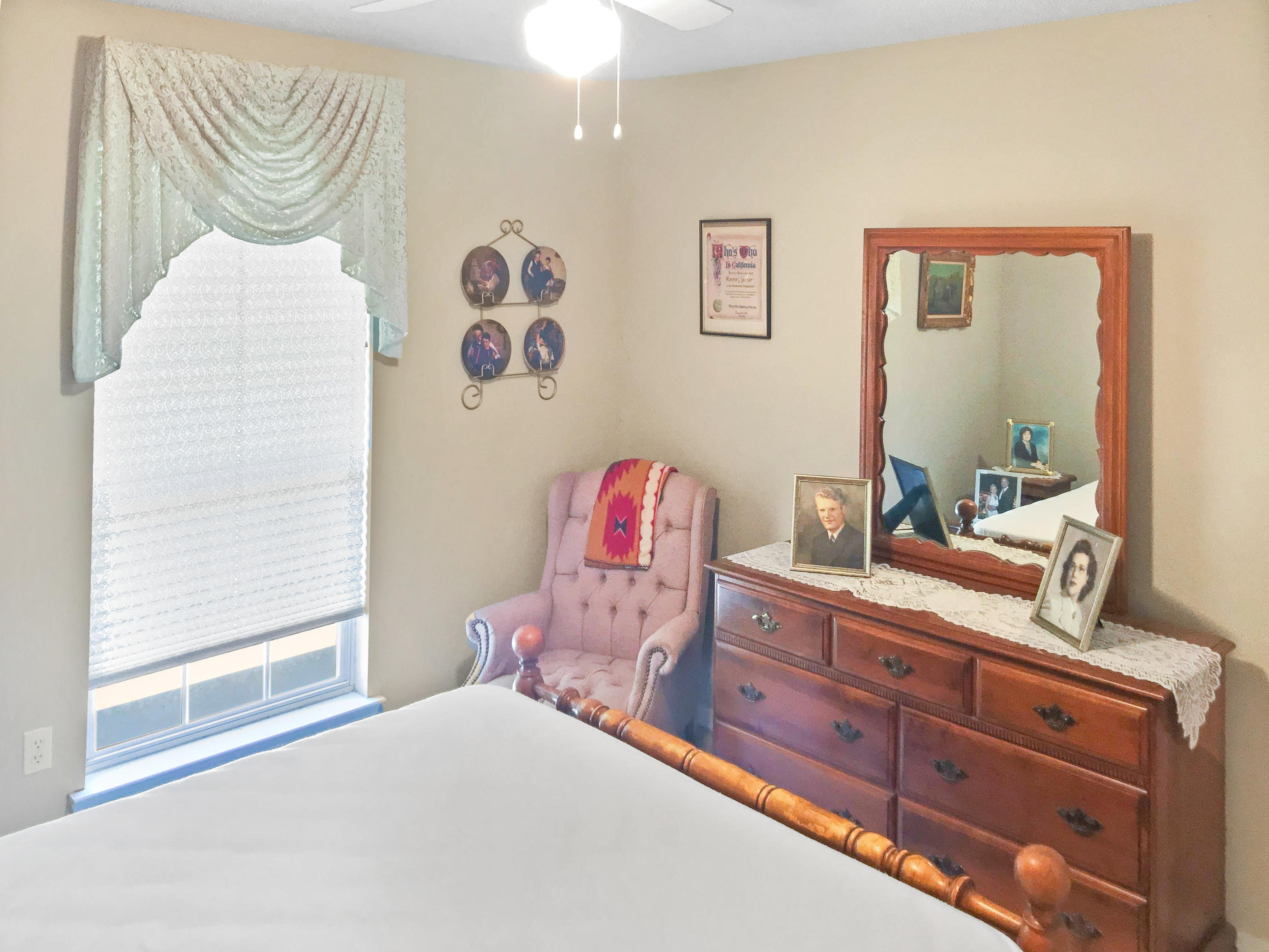 4441 Antioch Road Crestview, FL 32536 - Photo 5 of 14 a bedroom with a bed and a dresser in it