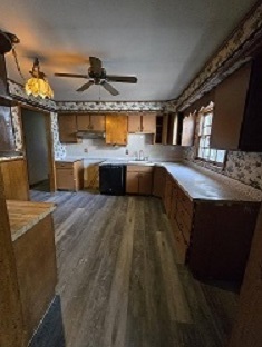 1406 Searle Drive Normal, IL 61761 - Photo 5 of 11 a view of living room kitchen with stainless steel appliances granite countertop furniture