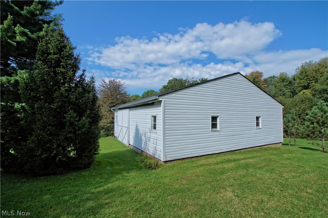 12757 Painesville Warren Road Painesville, OH 44077 - Photo 2 of 11 Barn building with 3 stalls.