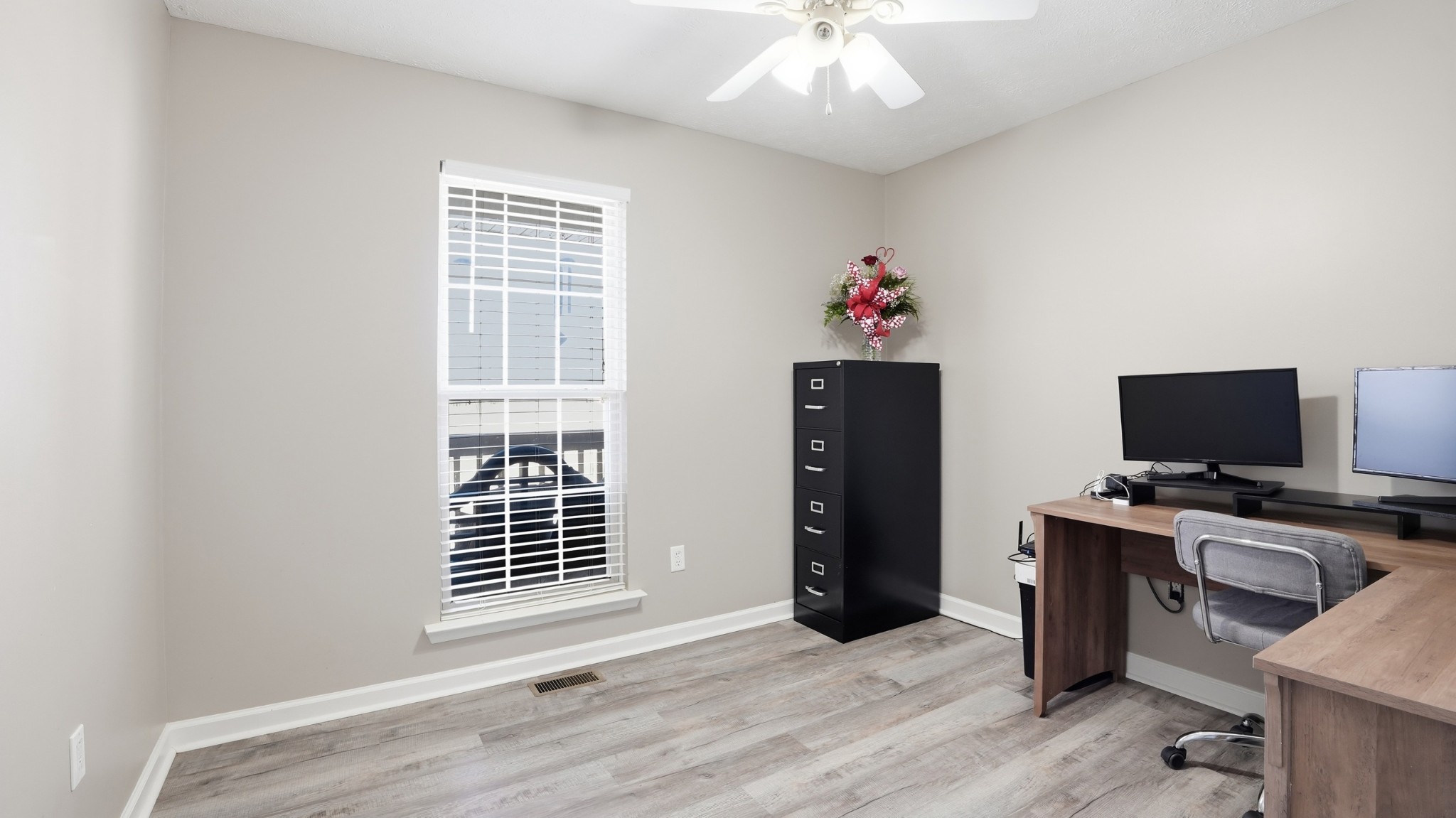 32 McGee Road McMinnville, TN 37110 - Photo 17 of 56 a view of a livingroom with workspace and a window